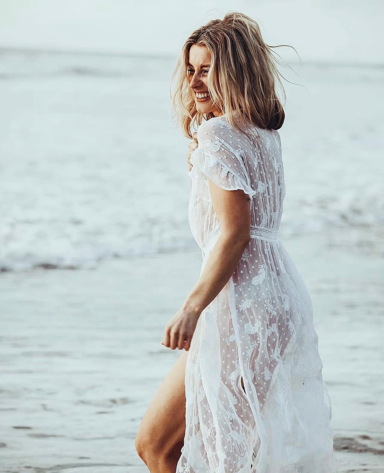 Leah walking freely on the beach